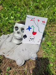 Drawing-skull-eyeball-flowers-vines-branches-spade