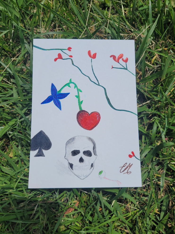 Drawing-skull-eyeball-flowers-vines-branches-spade
